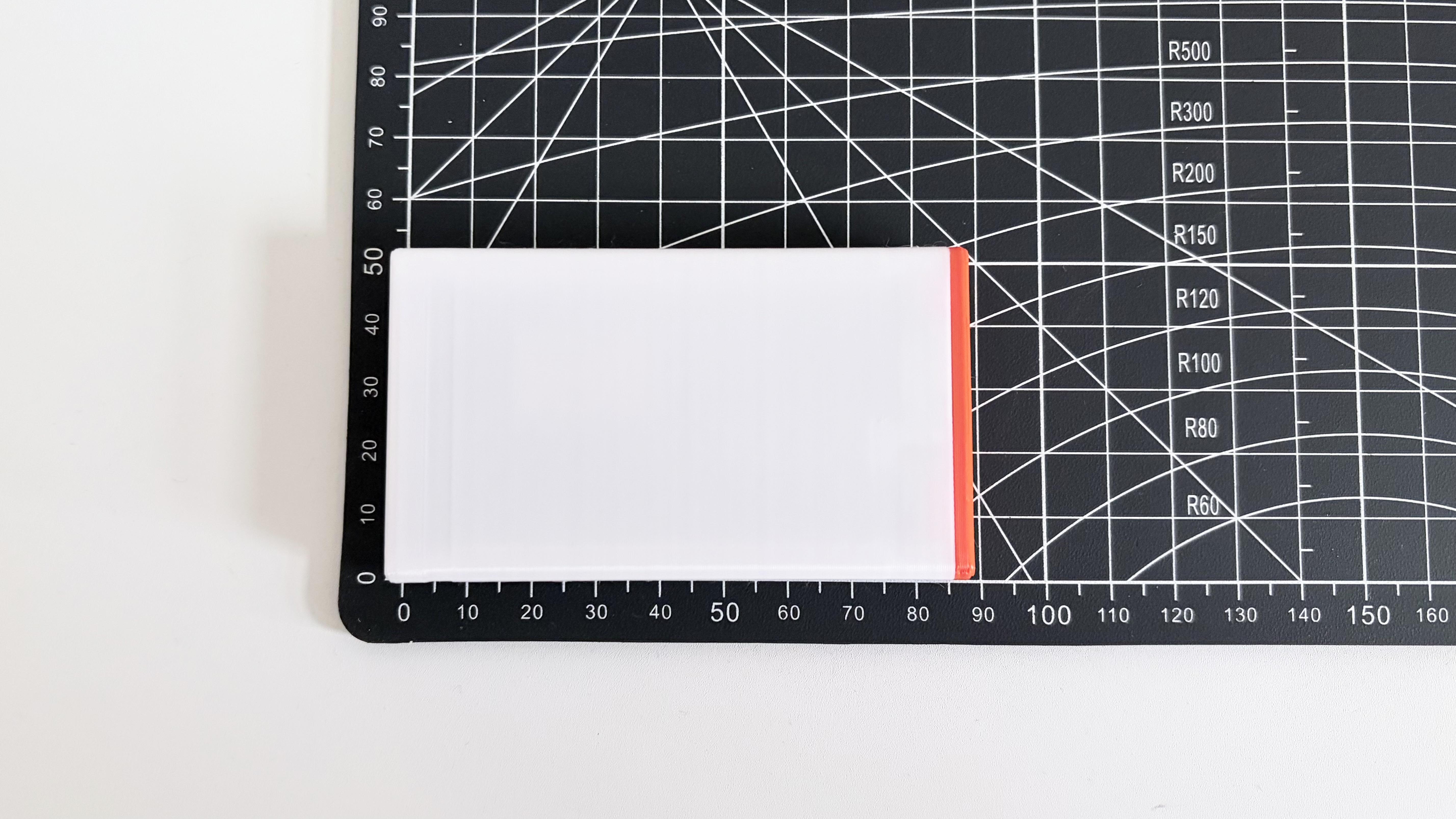 DezKVM-Go on a cutting mat, ~84mm long